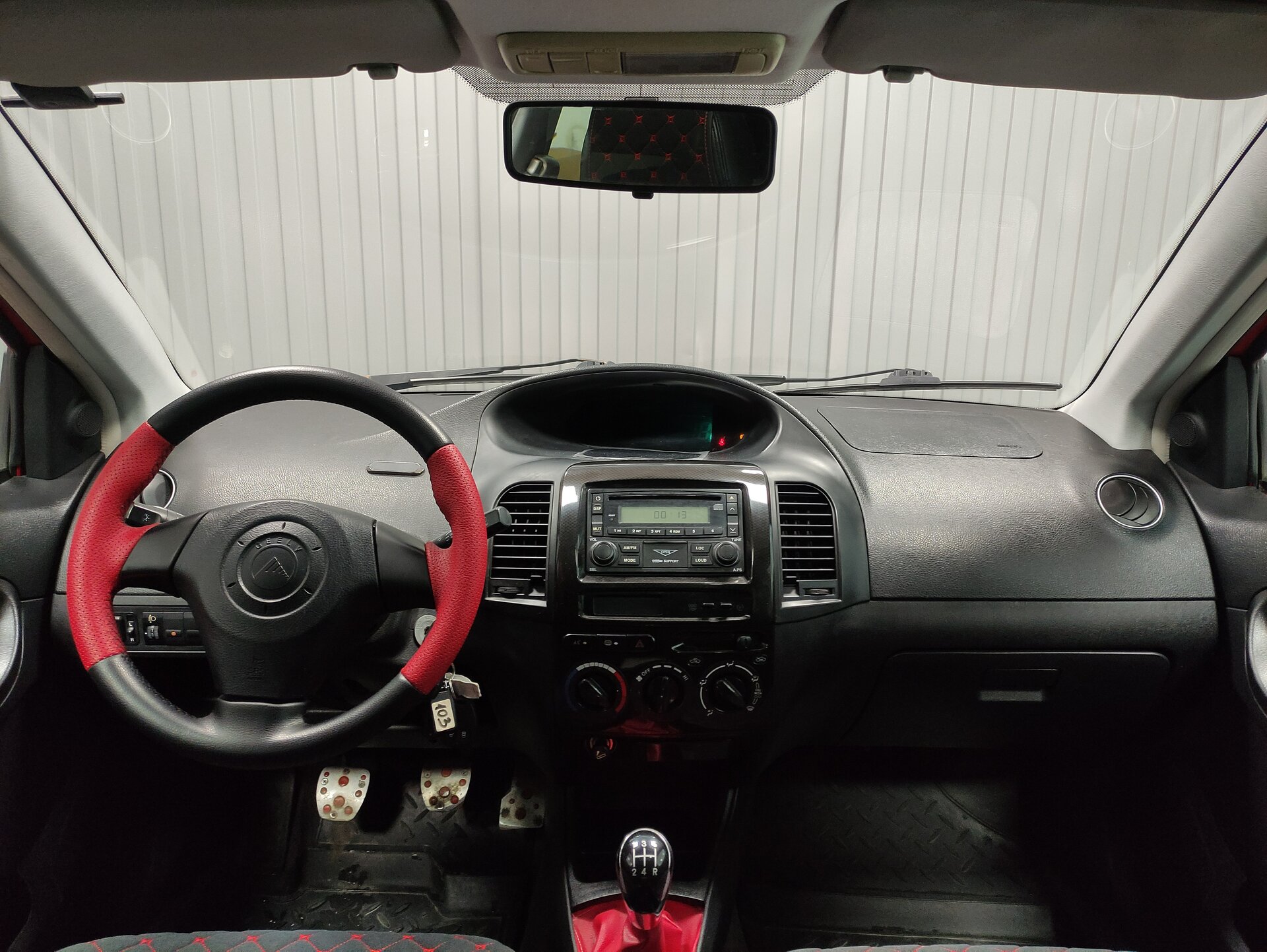 Geely MK Cross, I 2012