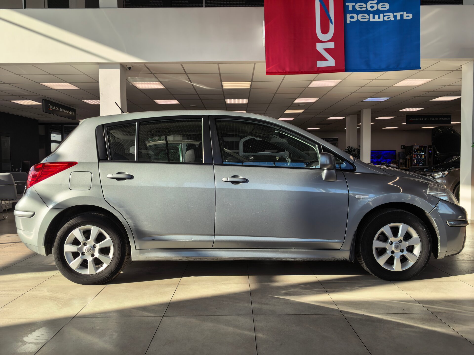 Nissan Tiida, I Рестайлинг 2011