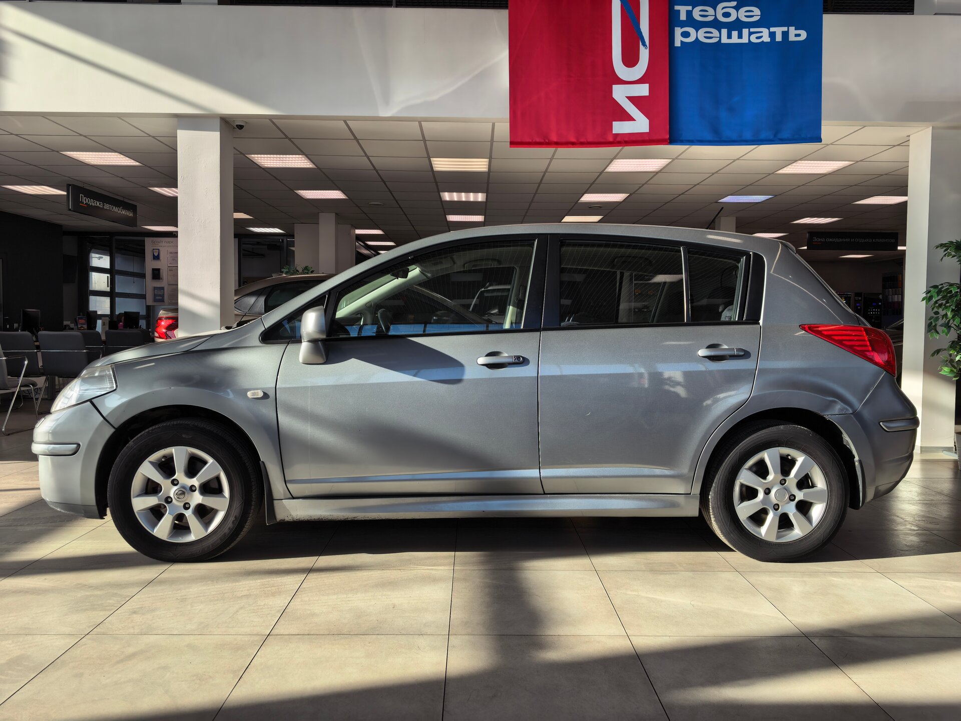 Nissan Tiida, I Рестайлинг 2011