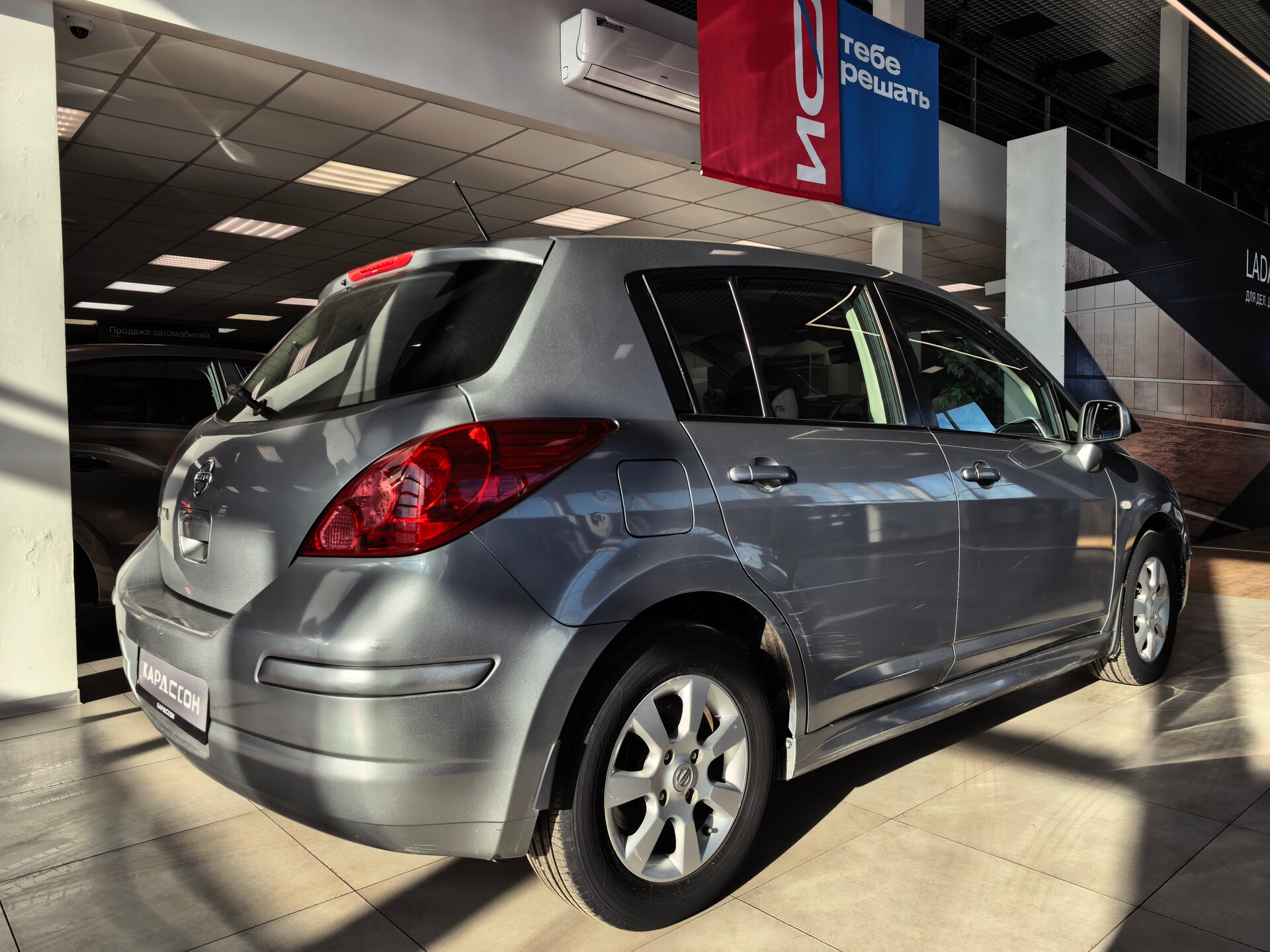 Nissan Tiida, I Рестайлинг 2011